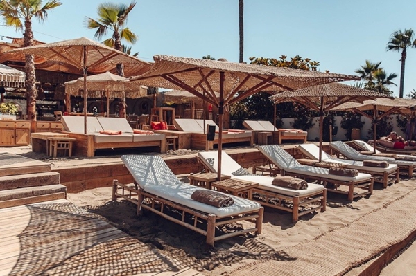 Sunbeds with parasols in Marbella