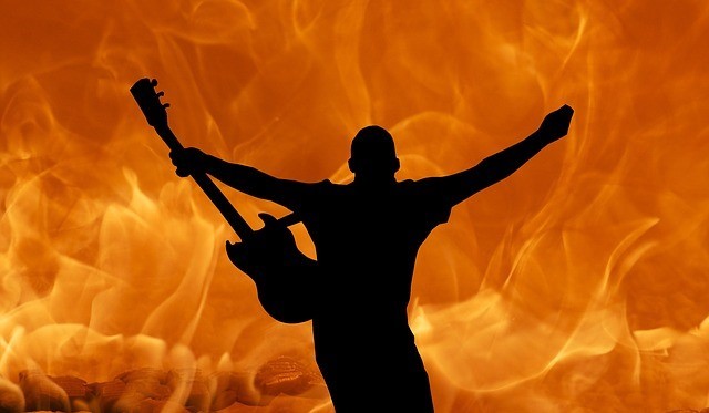 guitarist fiery background
