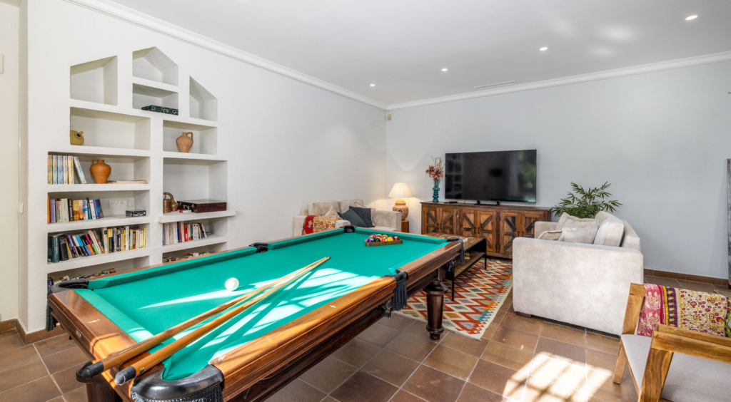 Entertainment space with pool table and large tv