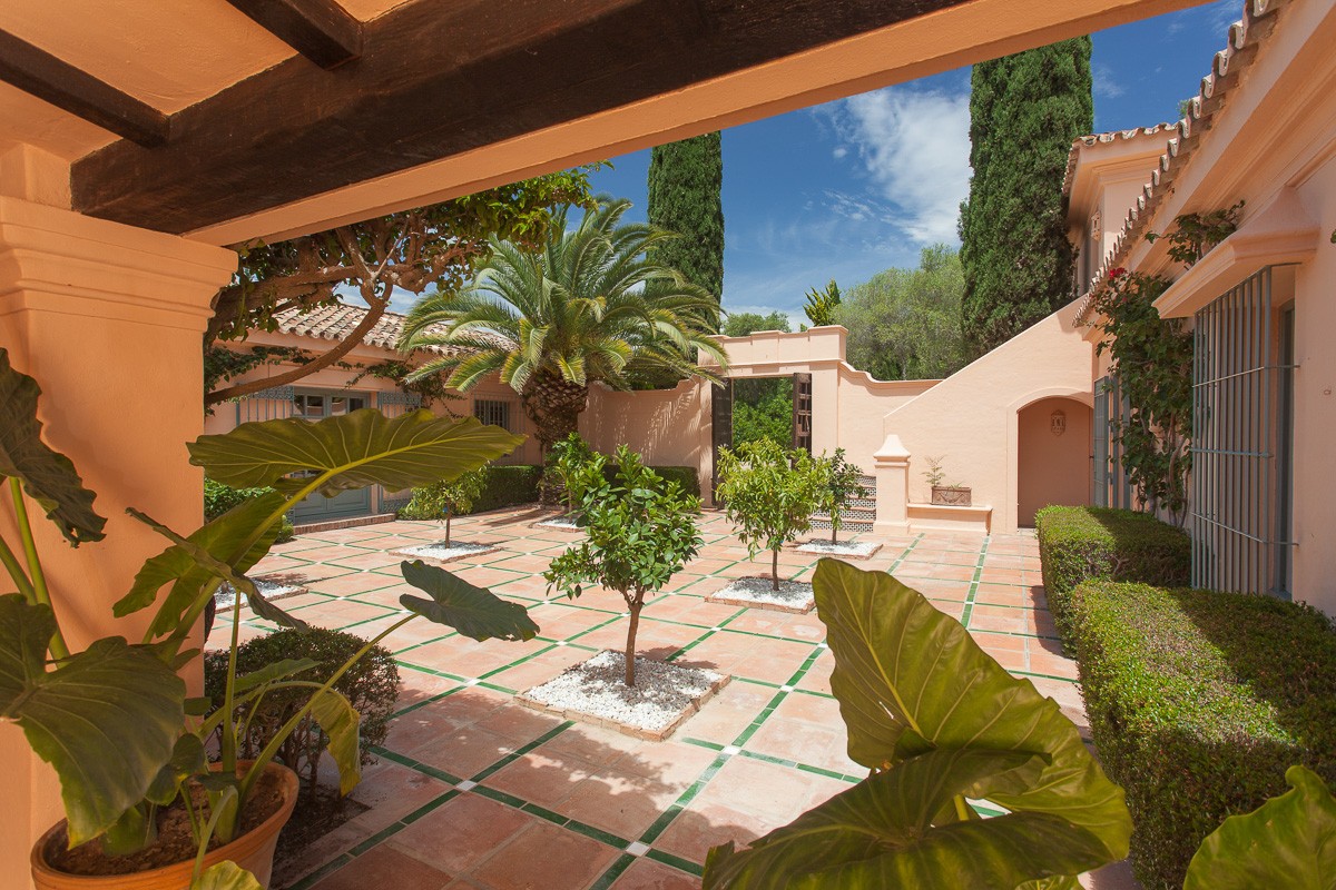 Courtyard patio at Villa El Chorrito Luxury villa with orange tree courtyard patio