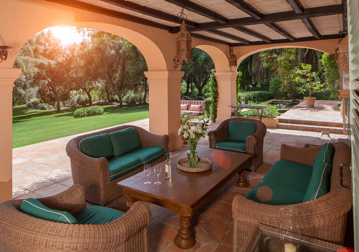 Private villa terrace in mature gardens Private villa terrace in mature gardens