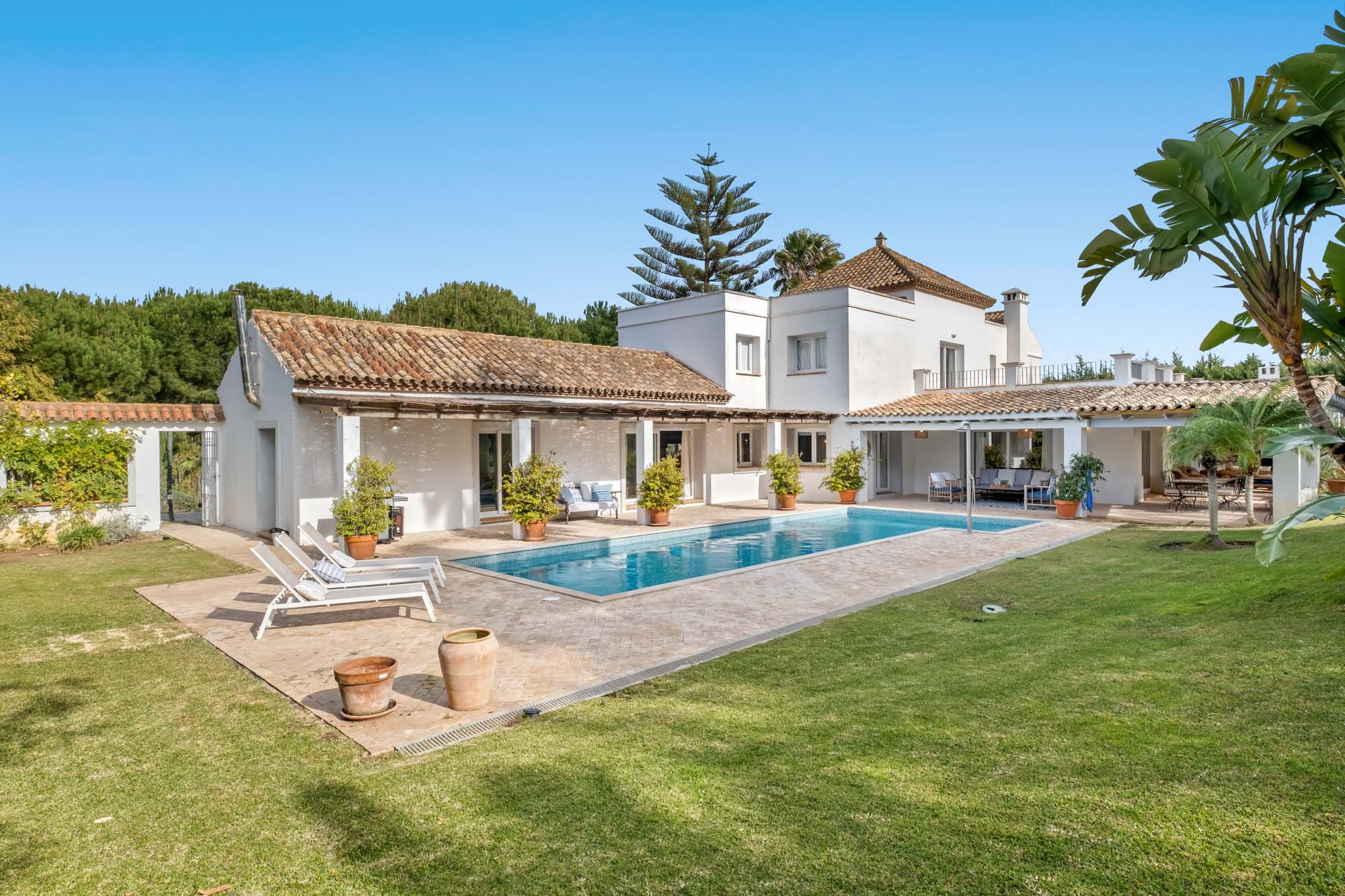 villa exterior with pool