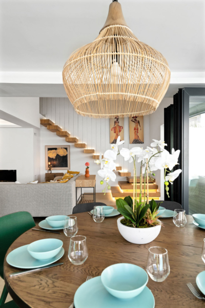 Modern dining table with pops of turquoise colour