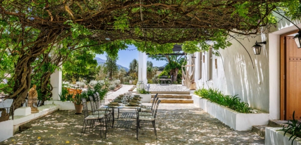 Shaded dining area on patio with views