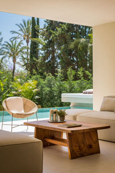 Poolside lounge area with shaded seating
